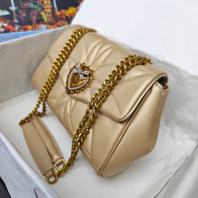 Dolce & Gabbana Gold Bags
