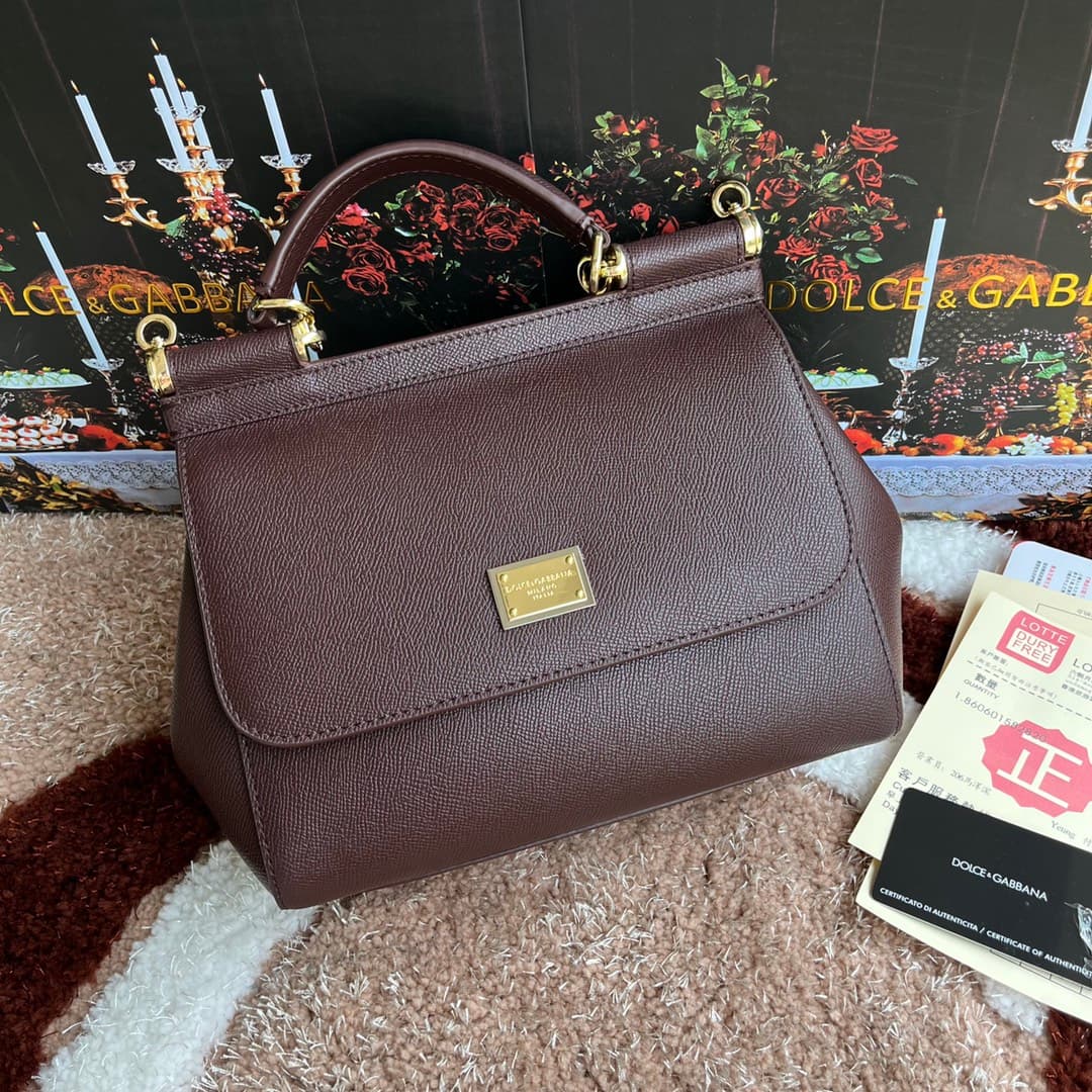 Dolce & Gabbana Gold Bags
