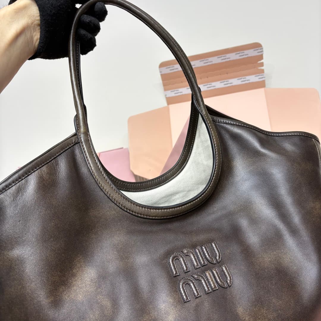 Louis Vuitton Gold Tote Bag